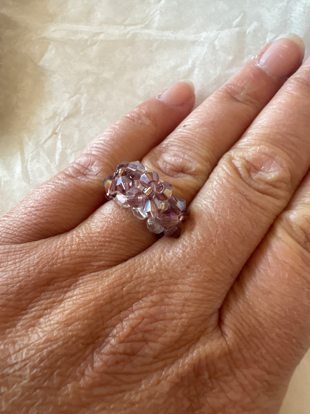 Bague fleurs swarovski ton violet métallisé transparent