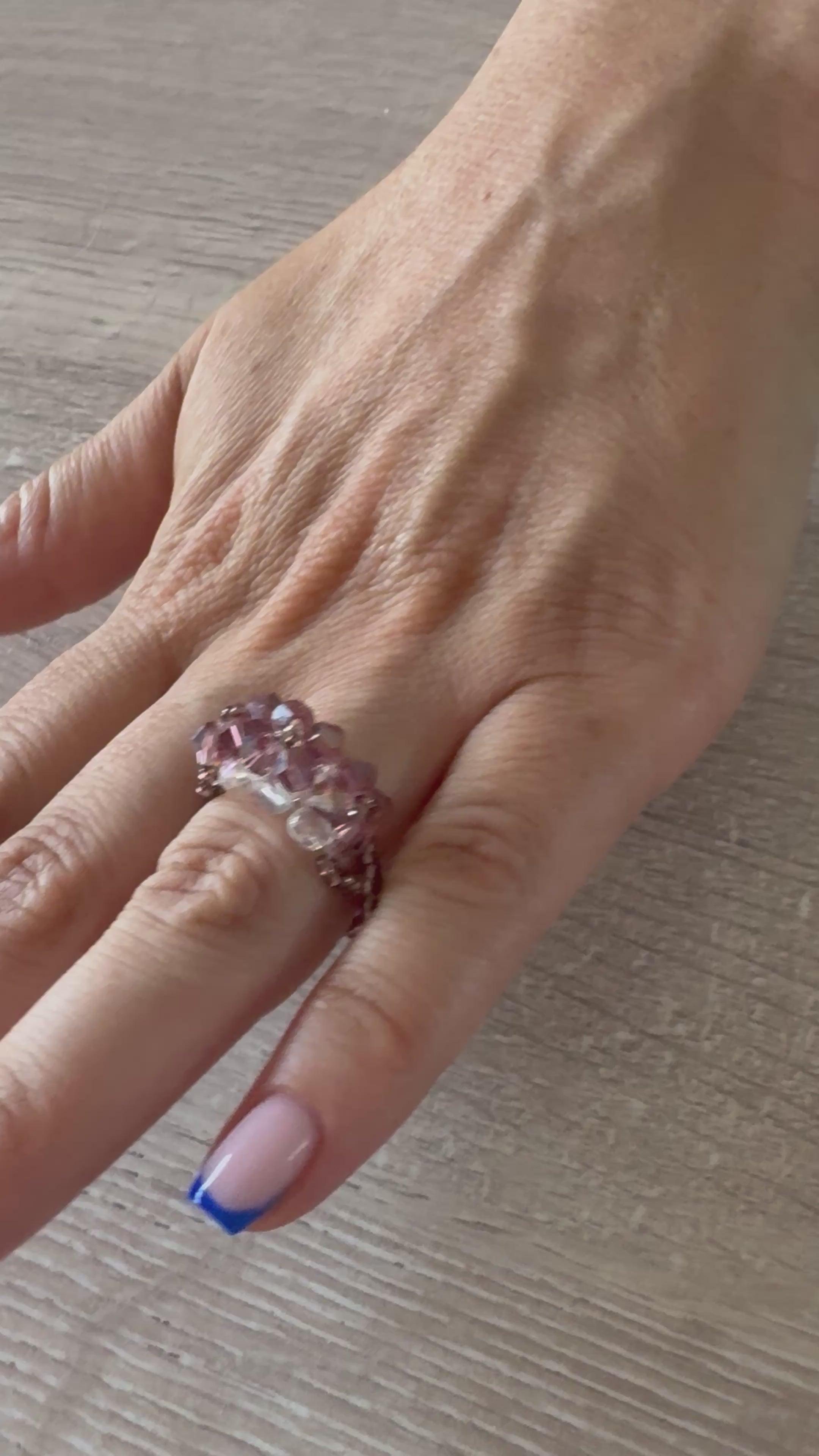 Bague fleurs swarovski ton violet métallisé transparent